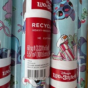2 rolls Disney Stitch wrapping paper, 1 acrylic ornament